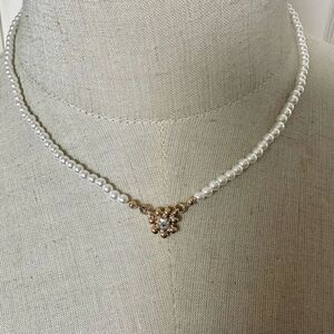 Faux pearl gold tone flower pendant necklace